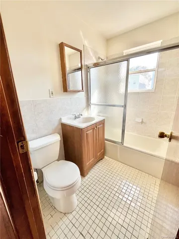 a bathroom with a toilet a sink and a bathtub