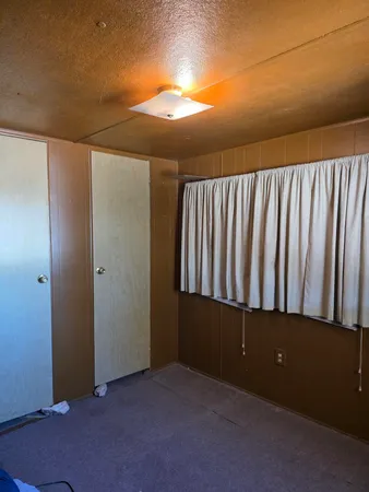 a bathroom with a shower and a toilet