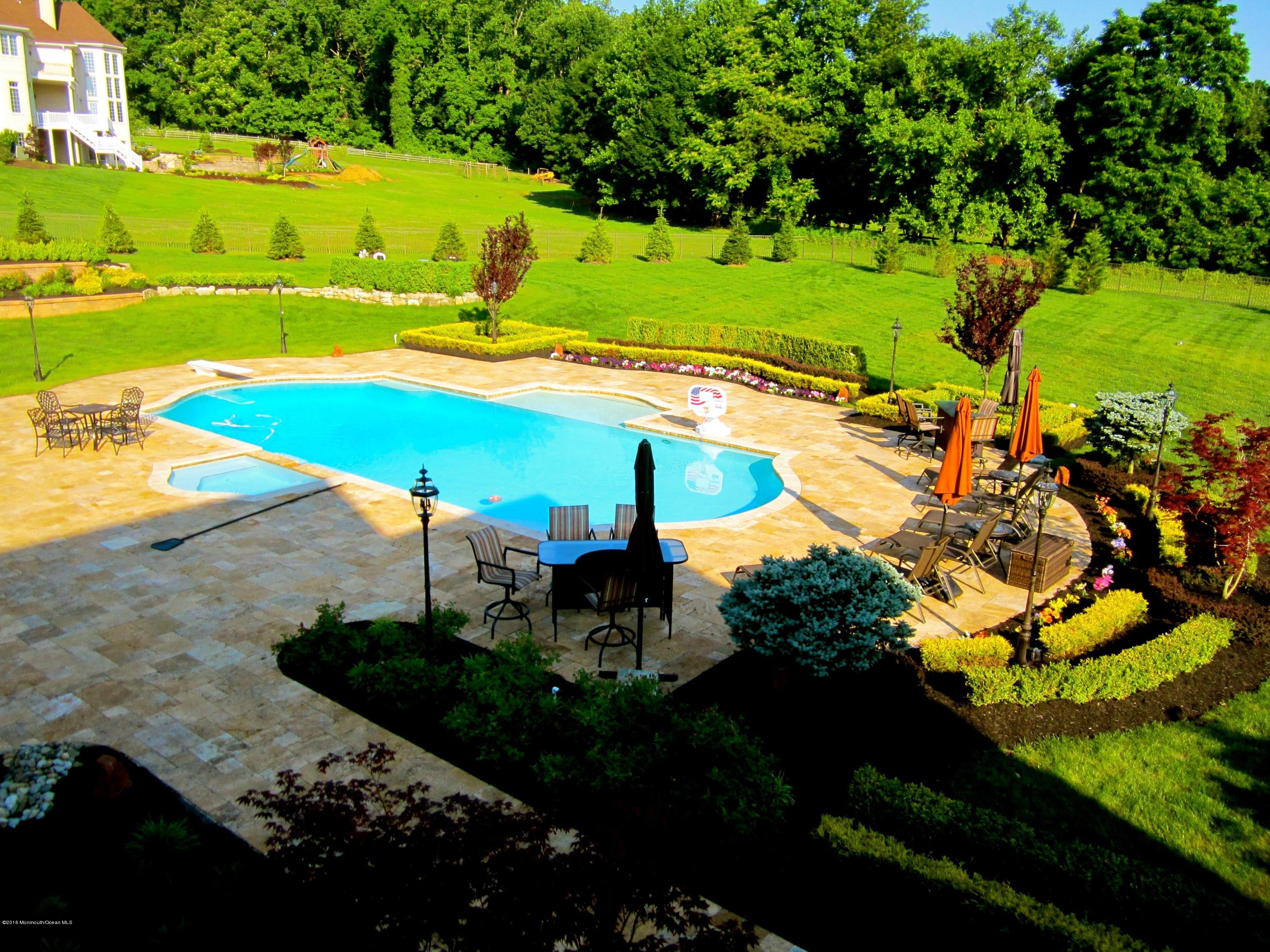 9 Embry Farm Road Marlboro, NJ 07746 - Photo 32 of 36 062_Pool In Summer