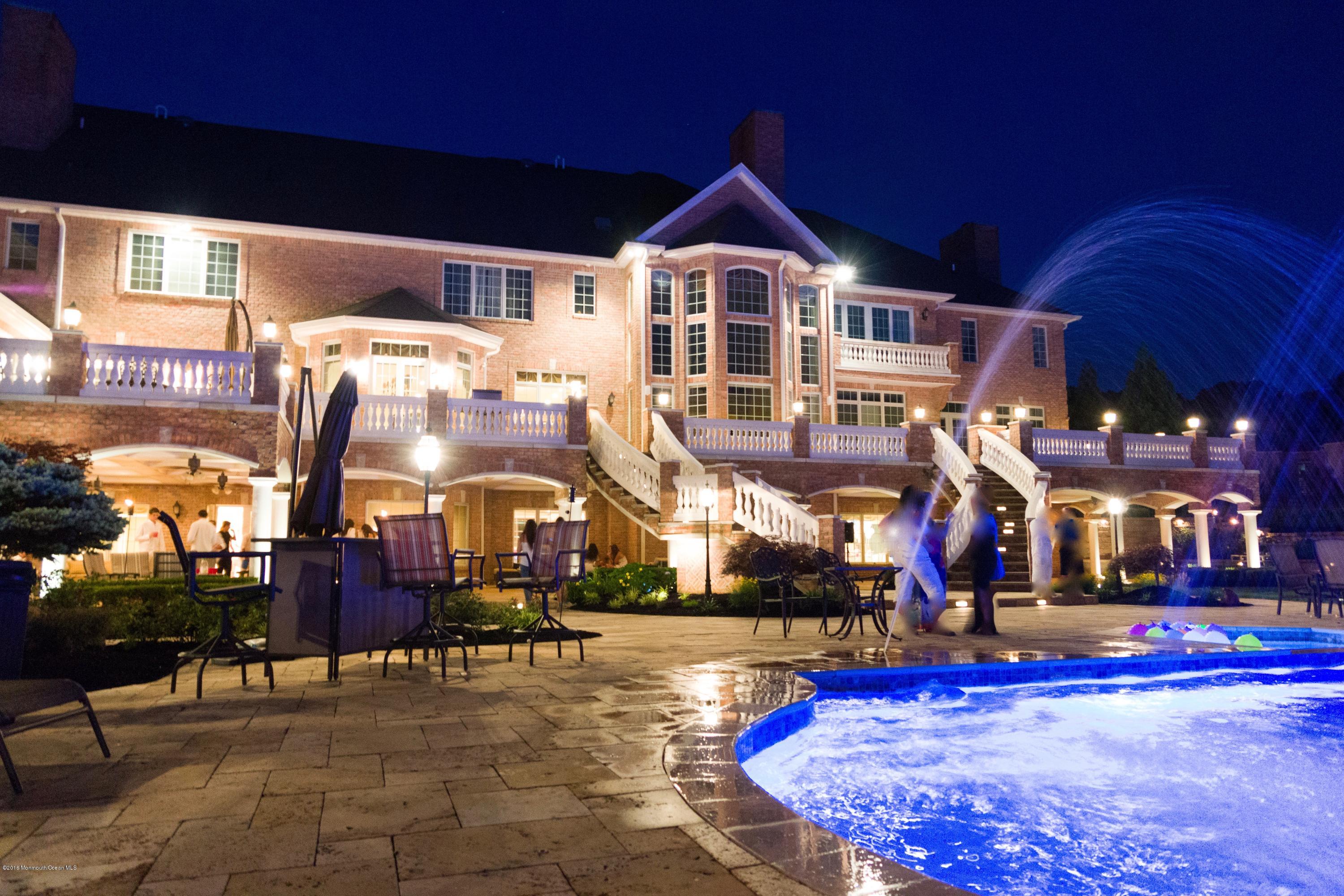 9 Embry Farm Road Marlboro, NJ 07746 - Photo 34 of 36 064_Patio and Covered Deck