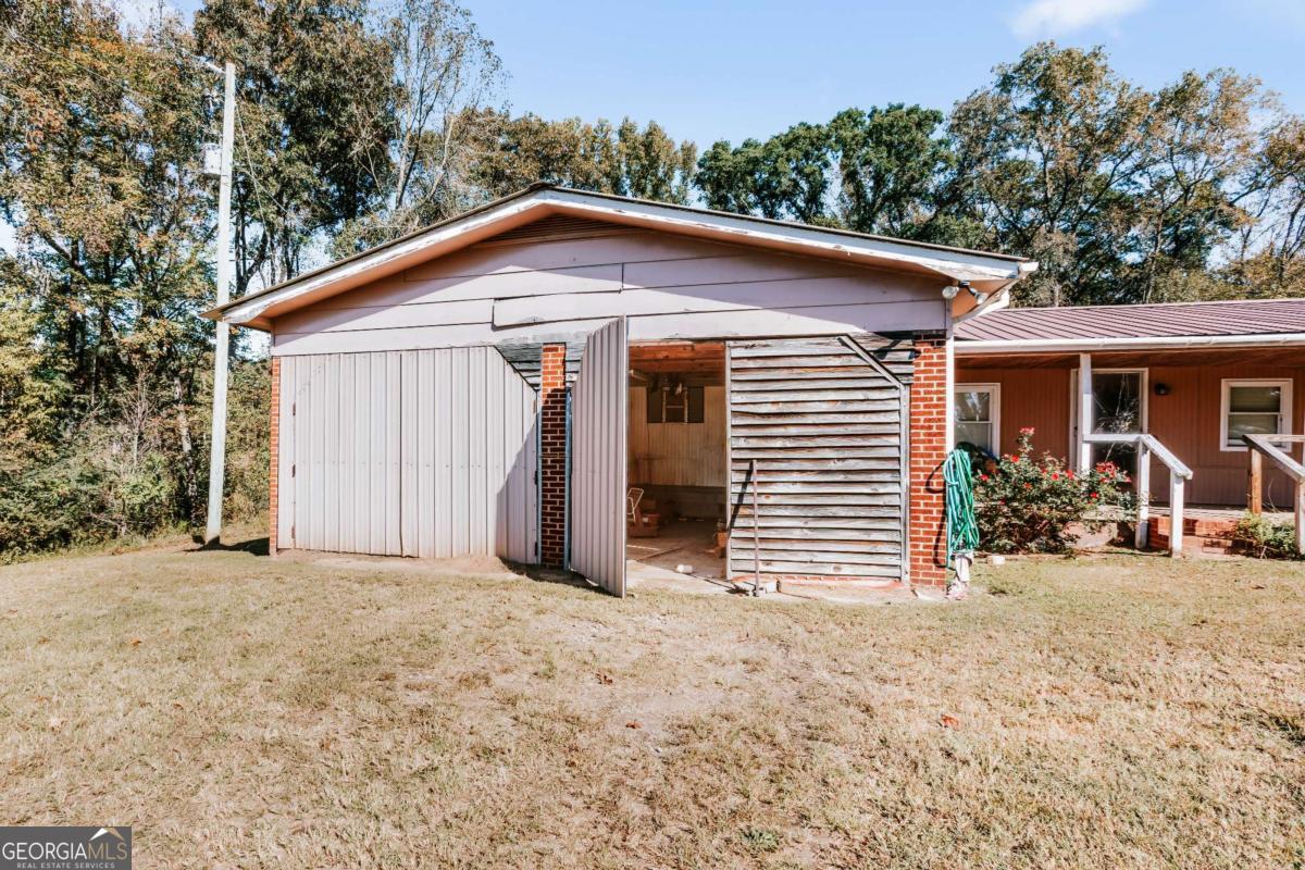 139 Wesley Chapel Road Lexington, GA 30648 - Photo 2 of 23 a view of a house with a yard