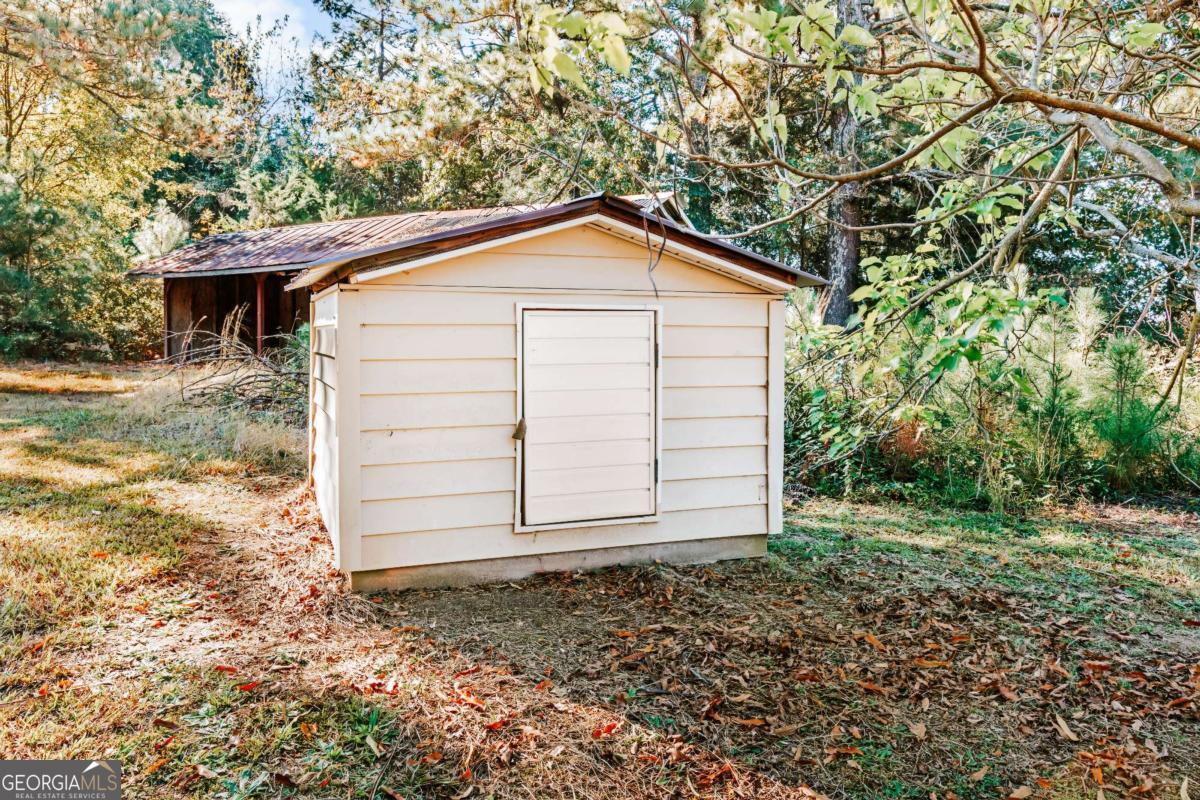 139 Wesley Chapel Road Lexington, GA 30648 - Photo 23 of 23 a view of a house with a yard