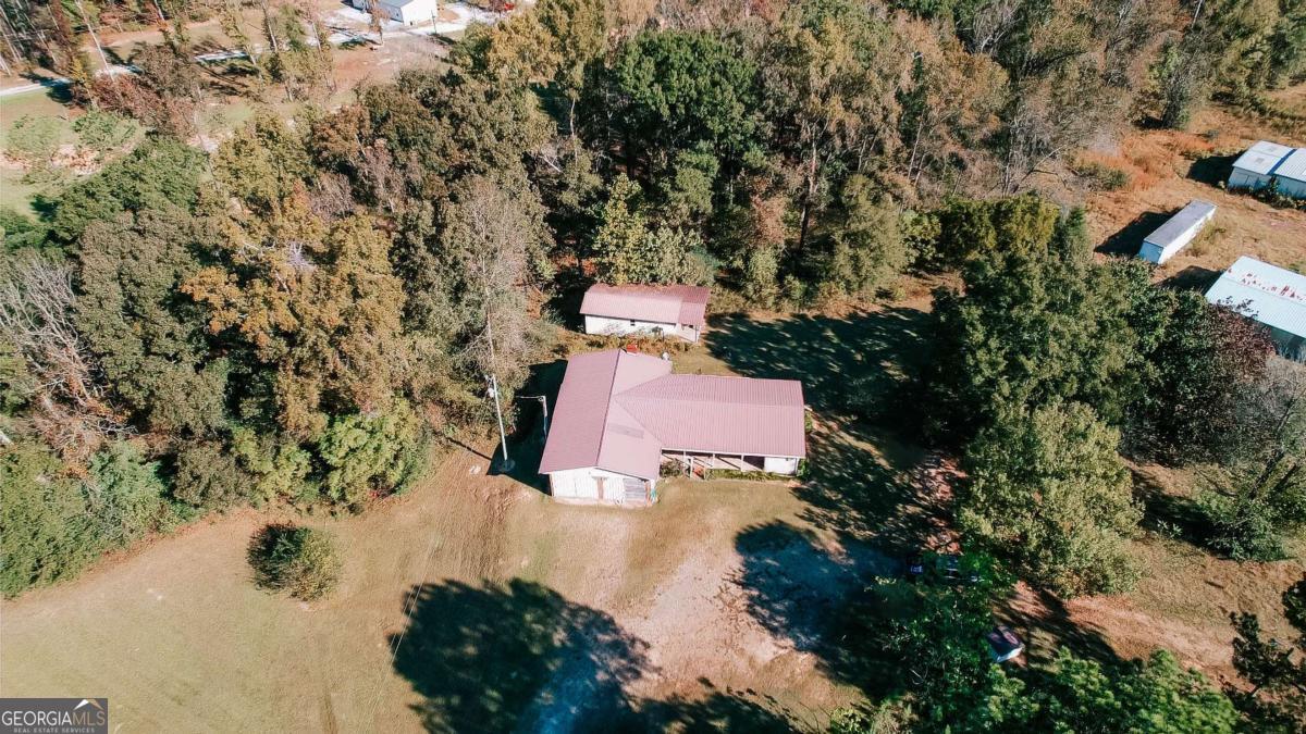 139 Wesley Chapel Road Lexington, GA 30648 - Photo 5 of 23 an aerial view of a house with a yard and garden