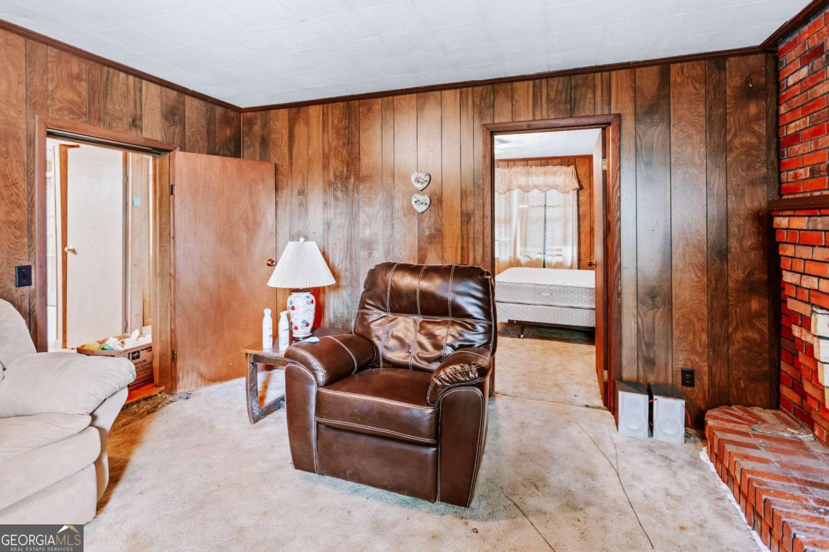 139 Wesley Chapel Road Lexington, GA 30648 - Photo 10 of 23 a living room with furniture and a window