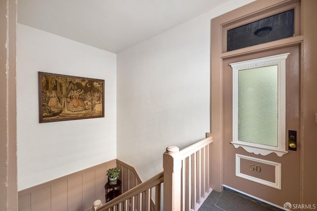 a view of a hallway with entryway