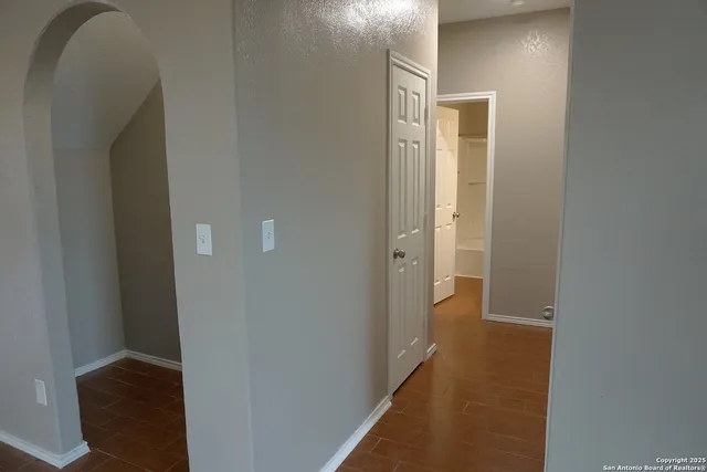 a view of a bathroom from the hallway