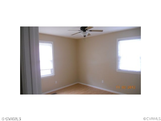 5400 Hair Road Disputanta, VA 23842 - Photo 6 of 7 a view of an empty room with a window