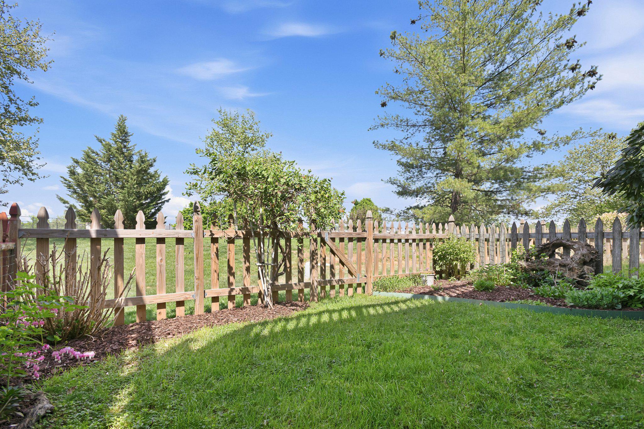 44100 Rising Sun Terrace Ashburn, VA 20147 - Photo 11 of 67 Fenced rear yard with beautiful landscaping
