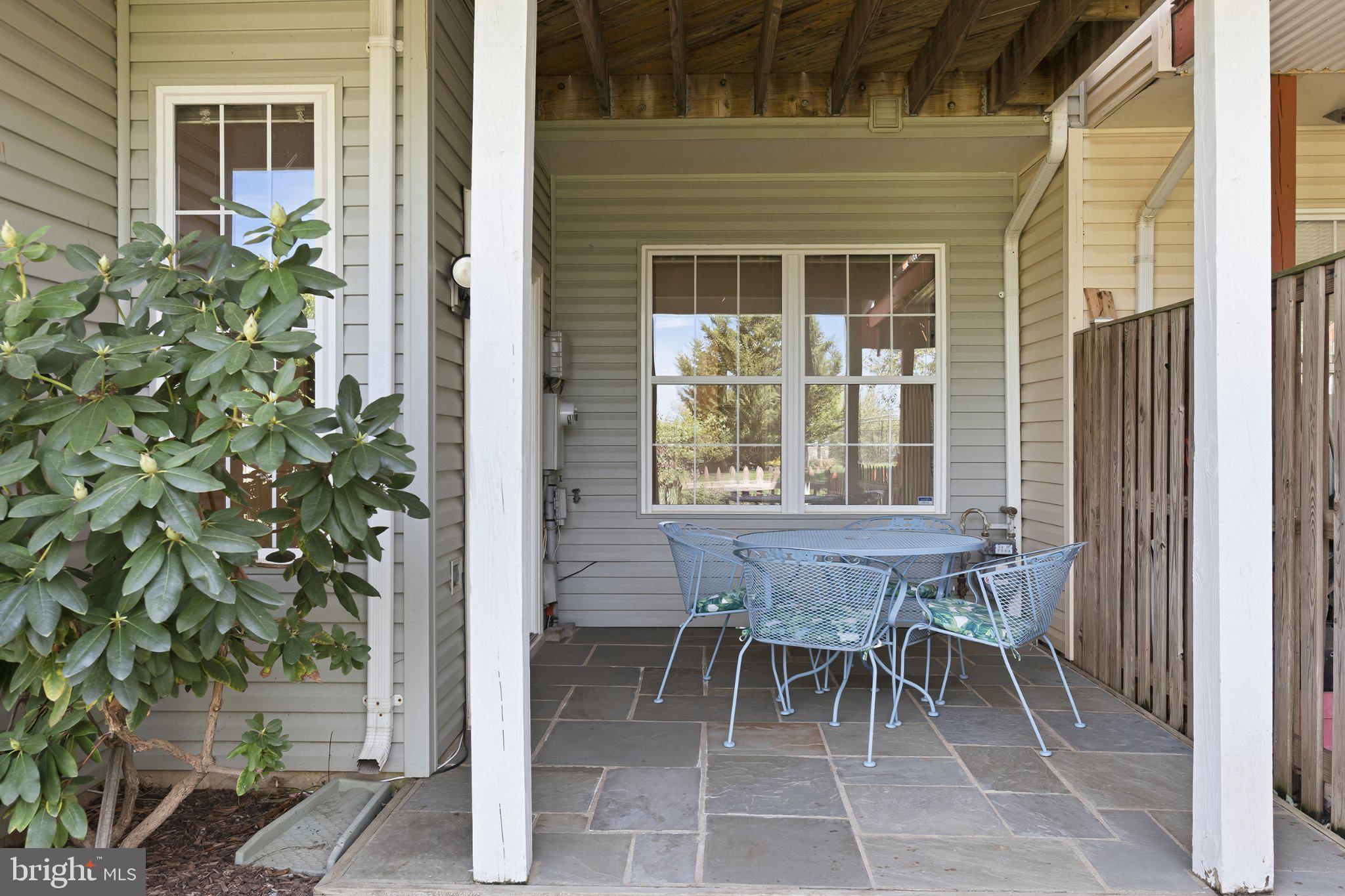 44100 Rising Sun Terrace Ashburn, VA 20147 - Photo 12 of 67 Charming patio retreat with greenery.