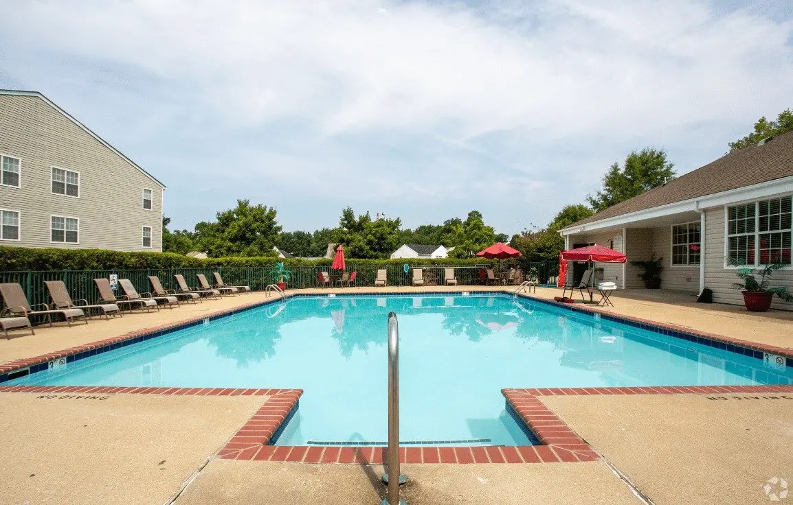 100 Marshview Drive Newport News, VA 23608 - Photo 2 of 15 a view of swimming pool with outdoor seating