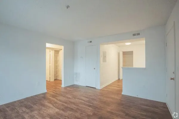 a view of an empty room and window