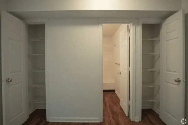 a view of a bathroom with a glass door shower