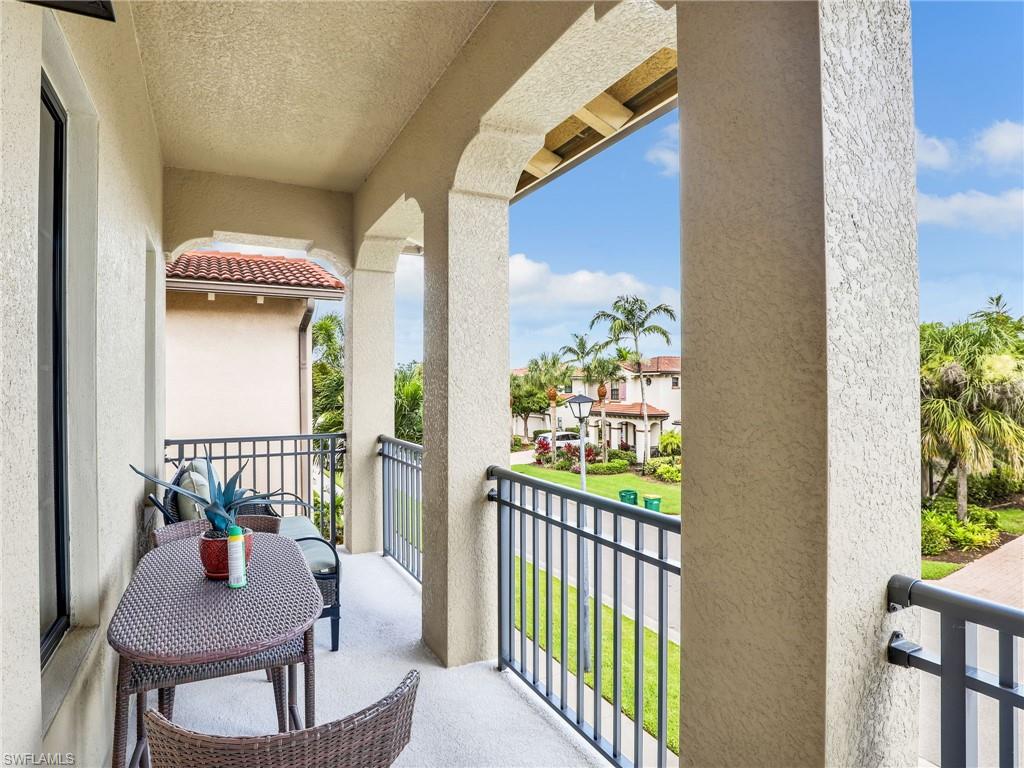 1242 Kendari Terrace Naples, FL 34113 - Photo 23 of 44 a view of a balcony with furniture
