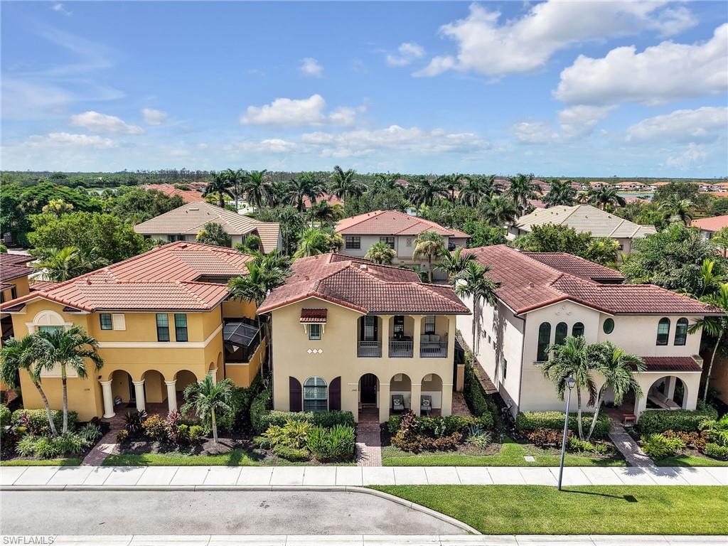 1242 Kendari Terrace Naples, FL 34113 - Photo 35 of 44 an aerial view of multiple houses