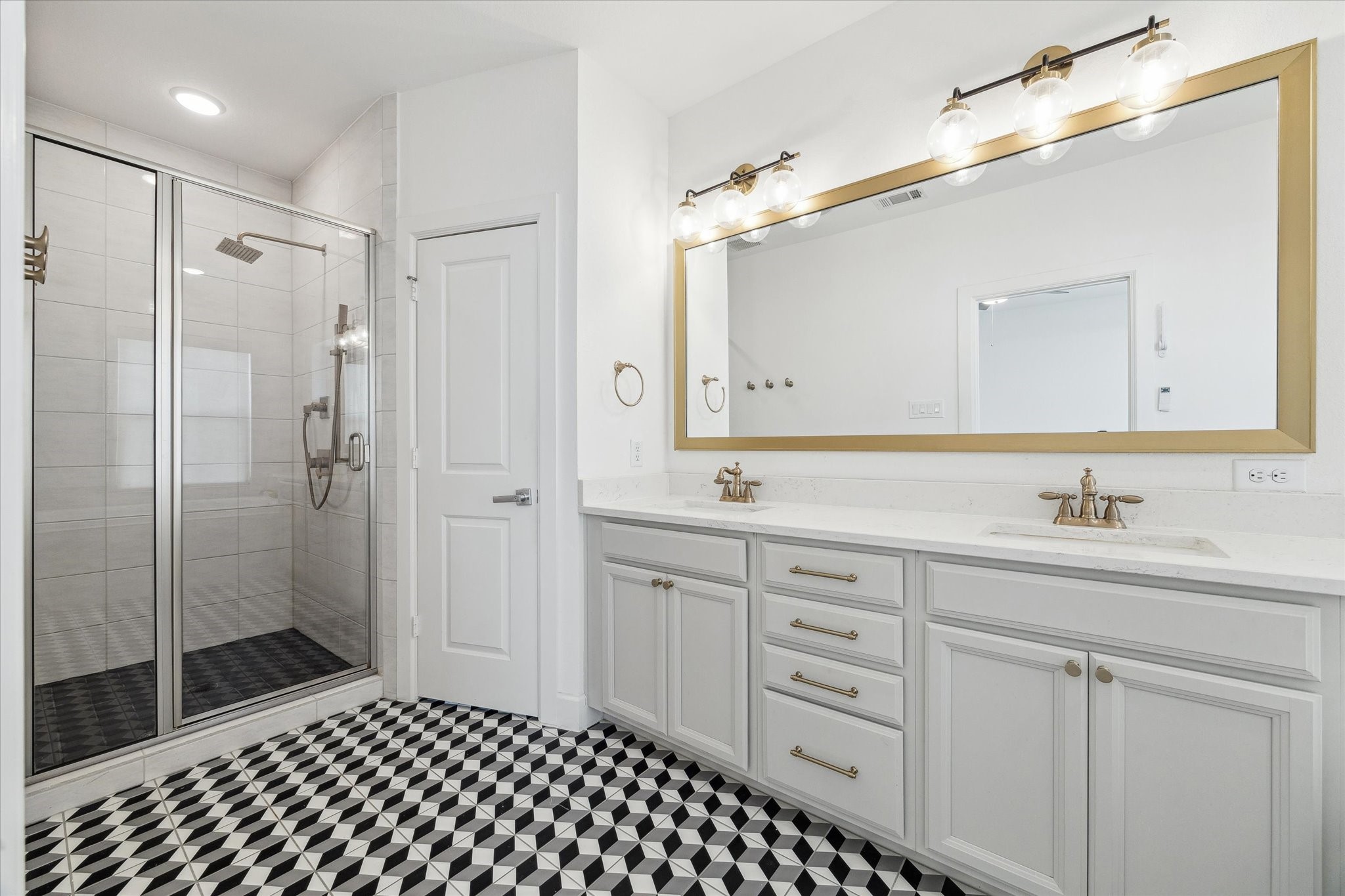 2714 Strathwood Lane Houston, TX 77082 - Photo 17 of 31 Primary bathroom with dual sinks, separate shower, designer tile flooring, great storage space.