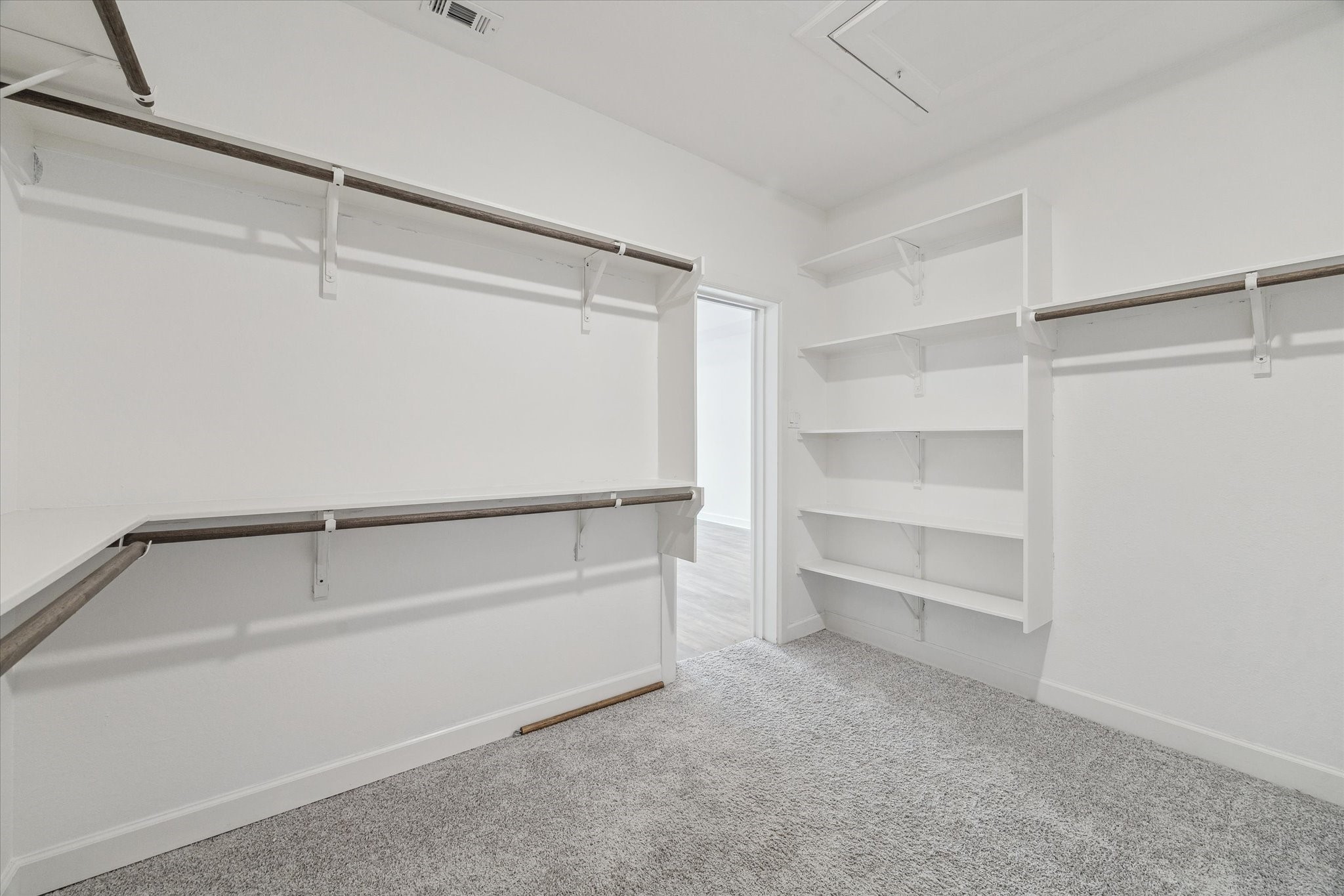2714 Strathwood Lane Houston, TX 77082 - Photo 23 of 35 Another view of the primary walk-in closet showing the built-in shelving