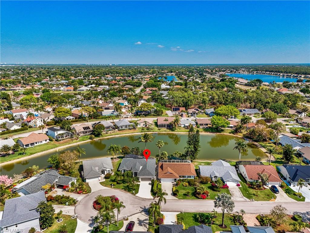 5235 Malvern Court Naples, FL 34112 - Photo 28 of 28 an aerial view of residential houses with outdoor space