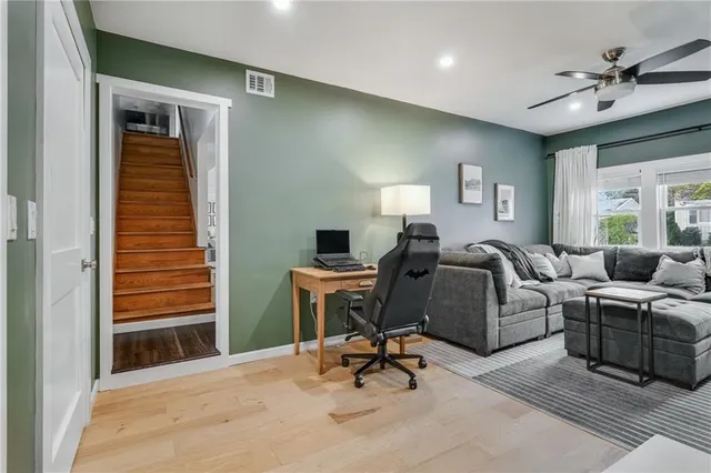 a living room with furniture and a window