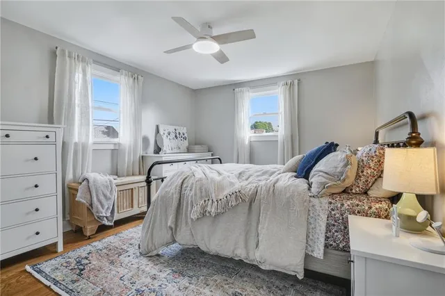 a bed room with a bed and a dresser