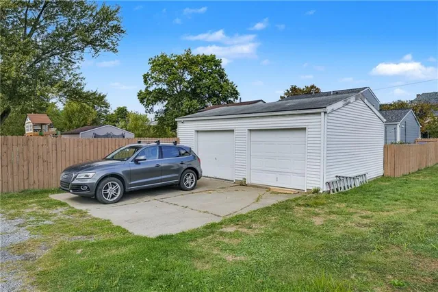 a car parked in front of a house