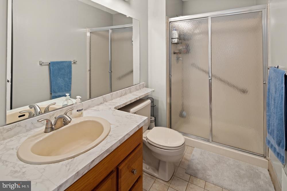 52 Willow Court Hamilton, NJ 08619 - Photo 14 of 23 a bathroom with a sink toilet and shower