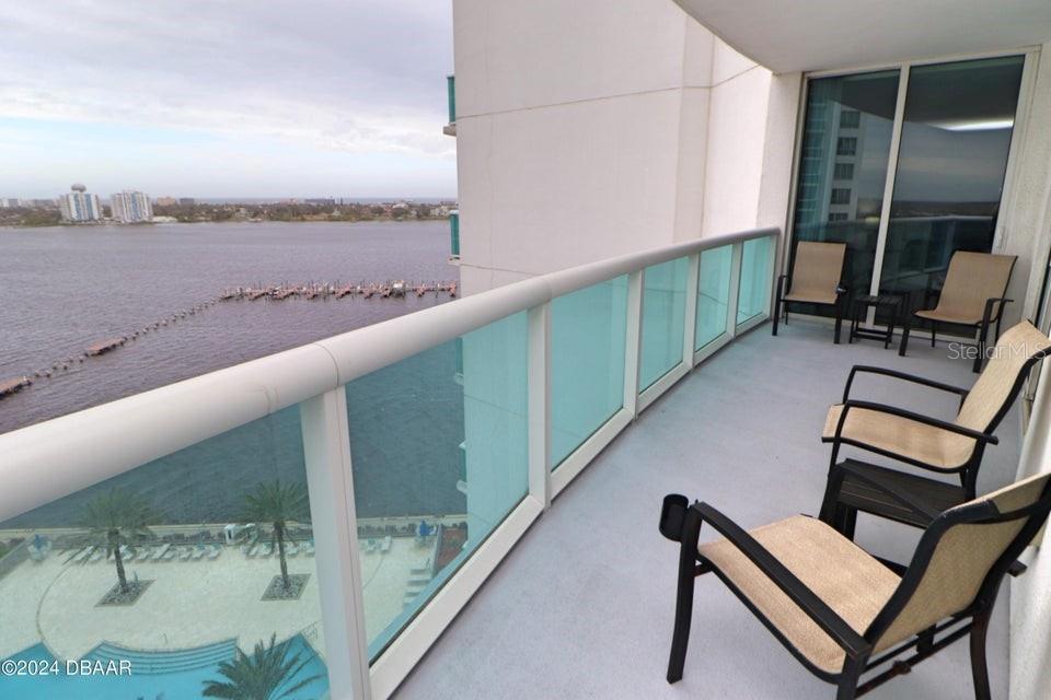 231 Riverside Drive, Unit 11061 Daytona Beach, FL 32117 - Photo 19 of 45 a view of a balcony with furniture