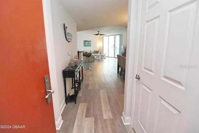 a very nice looking room with wooden floor