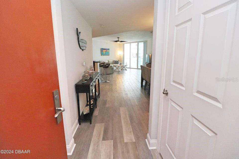 231 Riverside Drive, Unit 11061 Daytona Beach, FL 32117 - Photo 2 of 45 a very nice looking room with wooden floor