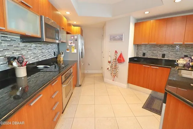 a view of balcony with furniture