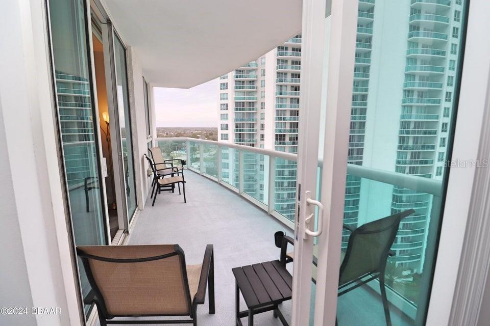 231 Riverside Drive, Unit 11061 Daytona Beach, FL 32117 - Photo 27 of 45 a view of balcony with furniture