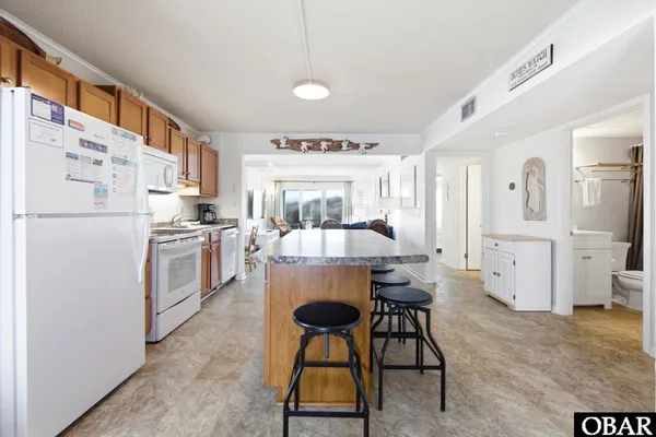$499,999 | 6317 South Virginia Dare Trail, Unit 104, Nags Head, NC 27959