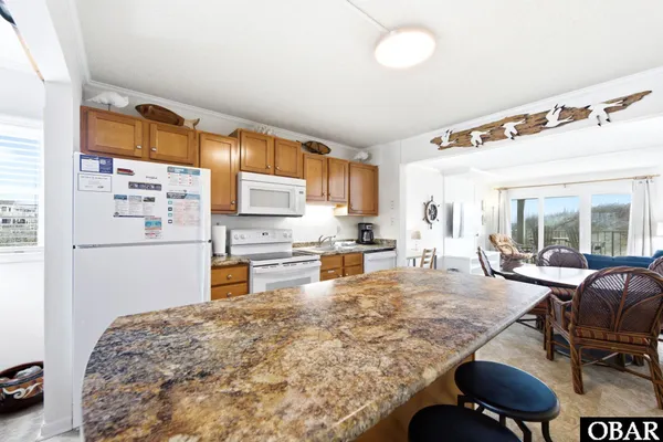 $499,999 | 6317 South Virginia Dare Trail, Unit 104, Nags Head, NC 27959