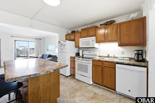 $499,999 | 6317 South Virginia Dare Trail, Unit 104, Nags Head, NC 27959