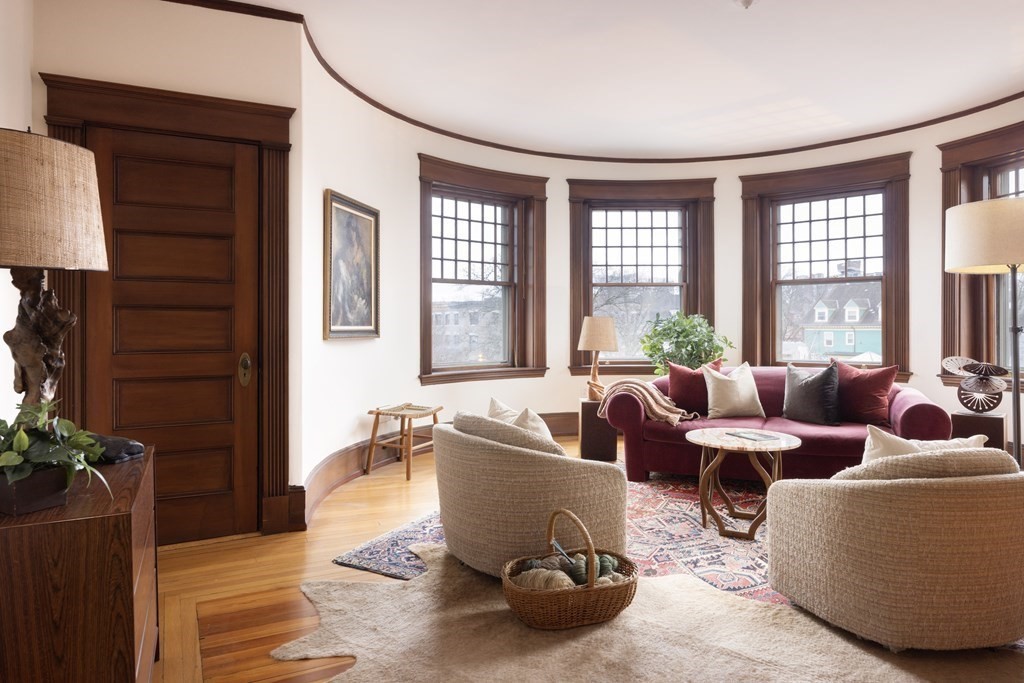 367 Harvard Street, Unit 3 Brookline, MA 02446 - Photo 1 of 25 a living room with furniture and a window