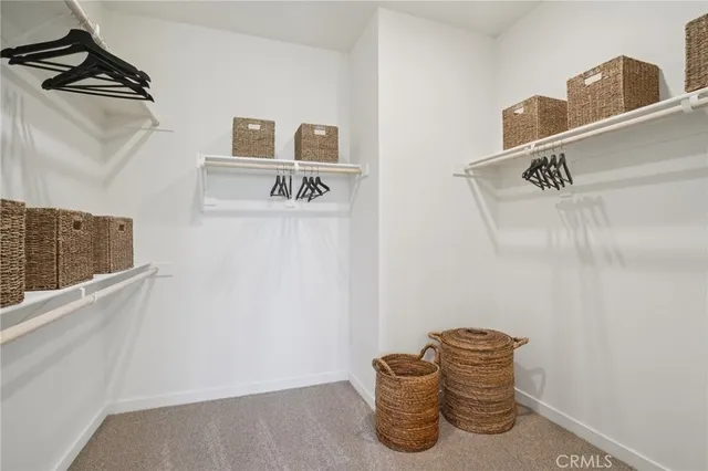 a bed room with a bed and a couch