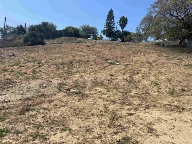 a view of a house with a street