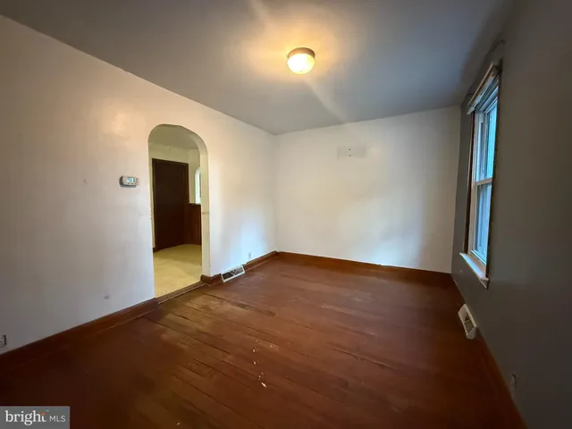 an empty room with window