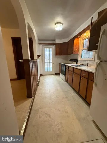 a view of utility room with windows