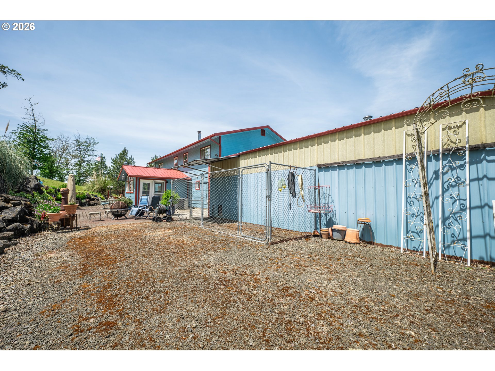 489 Fir Vista Road Sutherlin, OR 97479 - Photo 31 of 47 a view of a house with a backyard and a garage