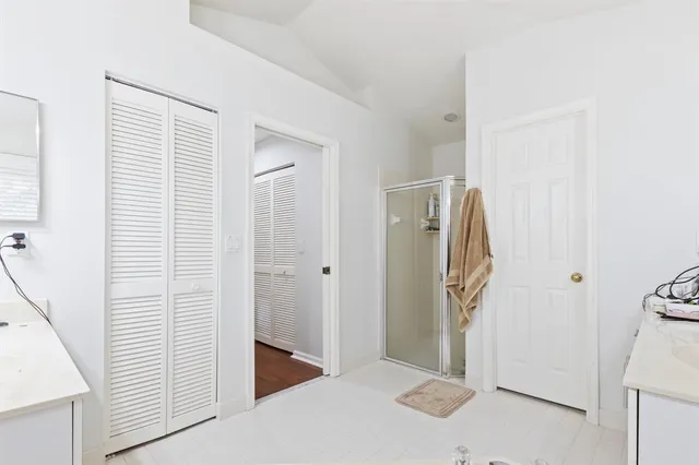 a view of a livingroom and a bathroom