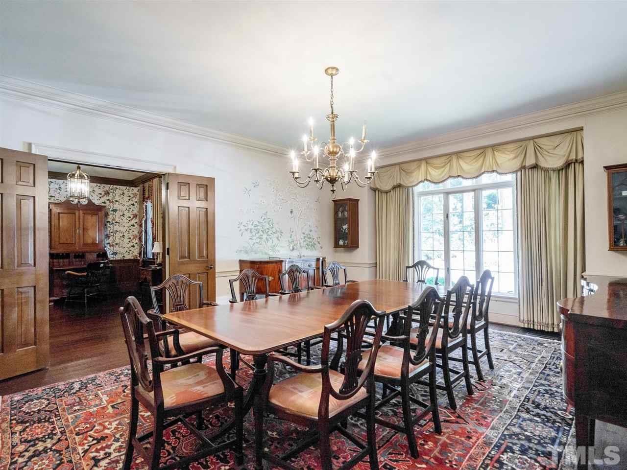 1001 Marlowe Road Raleigh, NC 27609 - Photo 3 of 25 a view of a dining room with furniture window and outside view