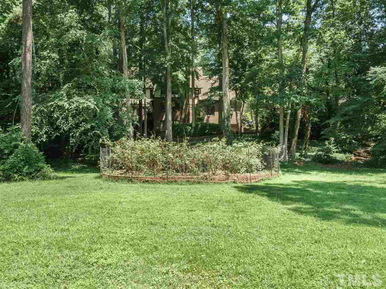 1001 Marlowe Road Raleigh, NC 27609 - Photo 22 of 25 a view of a backyard with large trees