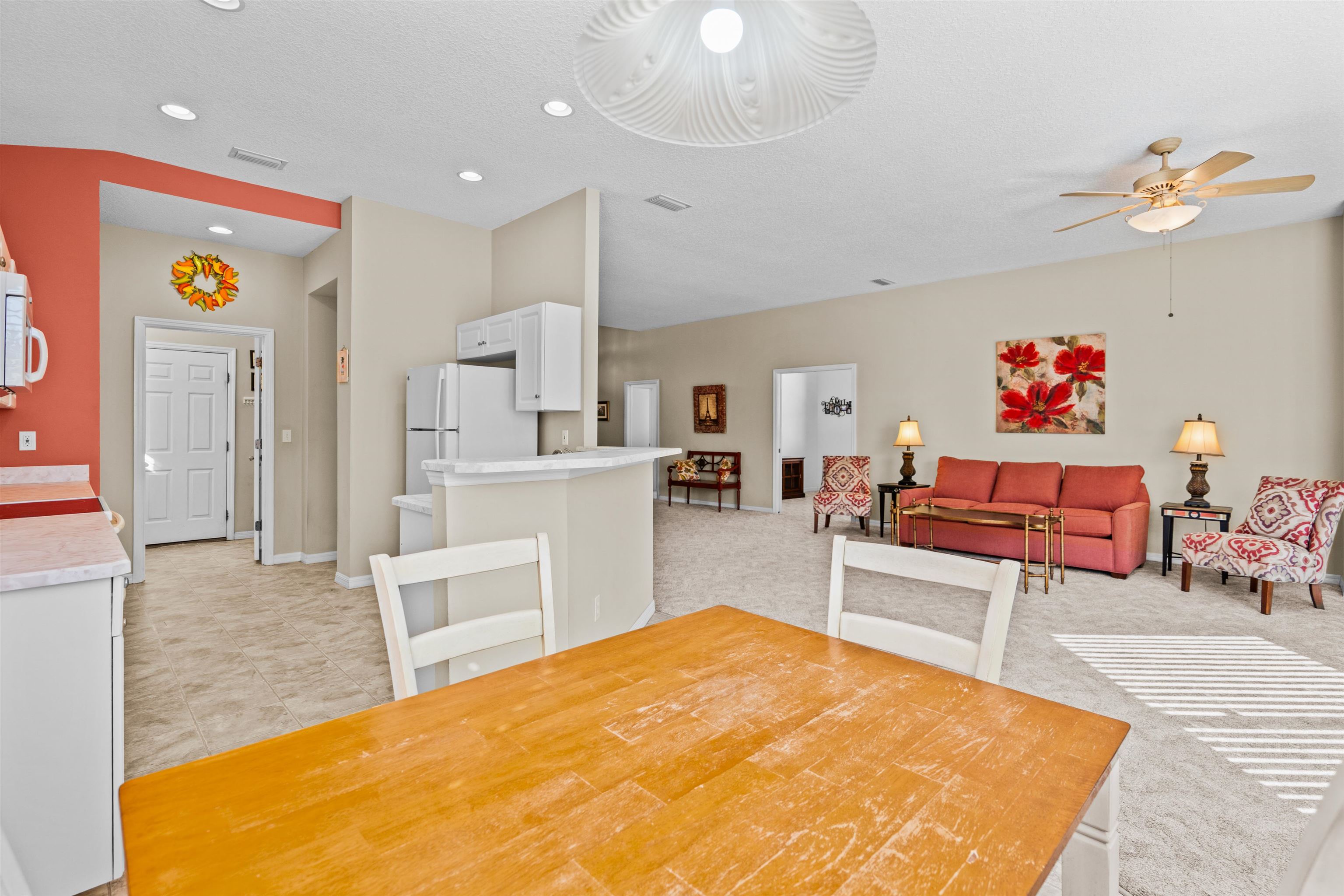660 Casa Fuerta Lane St. Augustine, FL 32080 - Photo 11 of 52 Dining space featuring a ceiling fan and a textured ceiling