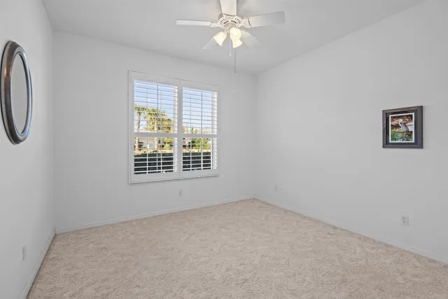 a view of a room with a large window