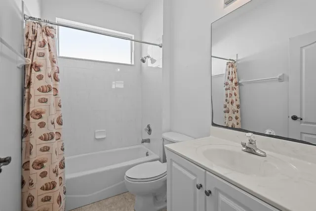 an aerial view of residential building with parking space