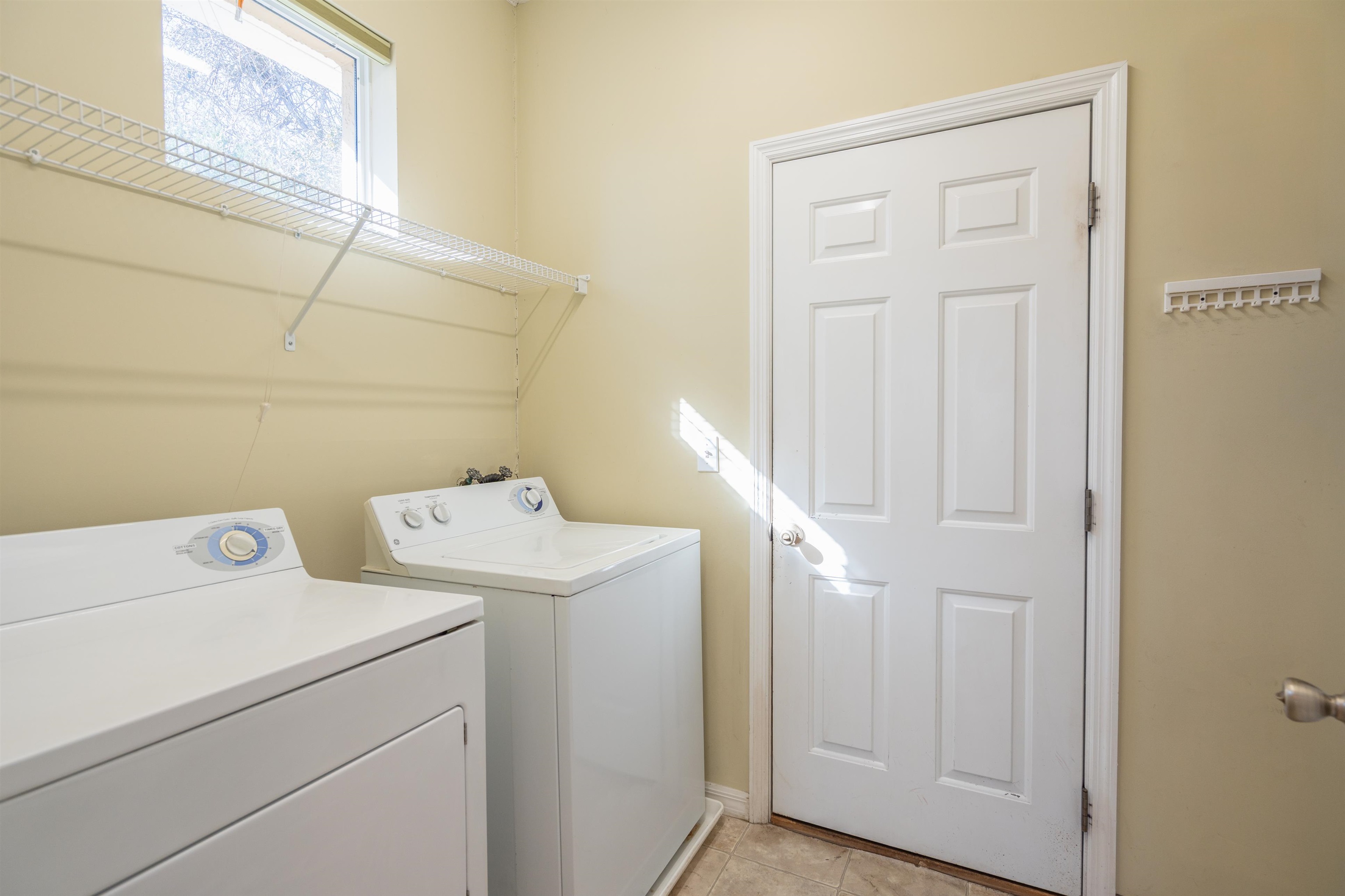 660 Casa Fuerta Lane St. Augustine, FL 32080 - Photo 20 of 52 a utility room with dryer and washer
