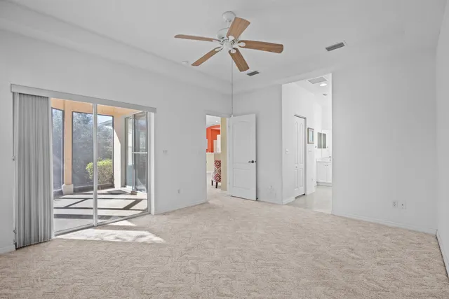 an aerial view of a house with a ocean view