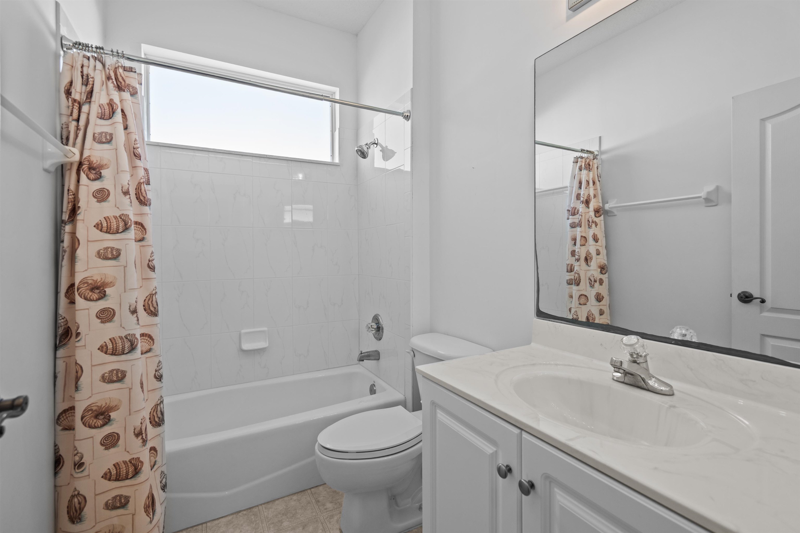 660 Casa Fuerta Lane St. Augustine, FL 32080 - Photo 48 of 52 Full bathroom featuring vanity and shower / tub combo with curtain