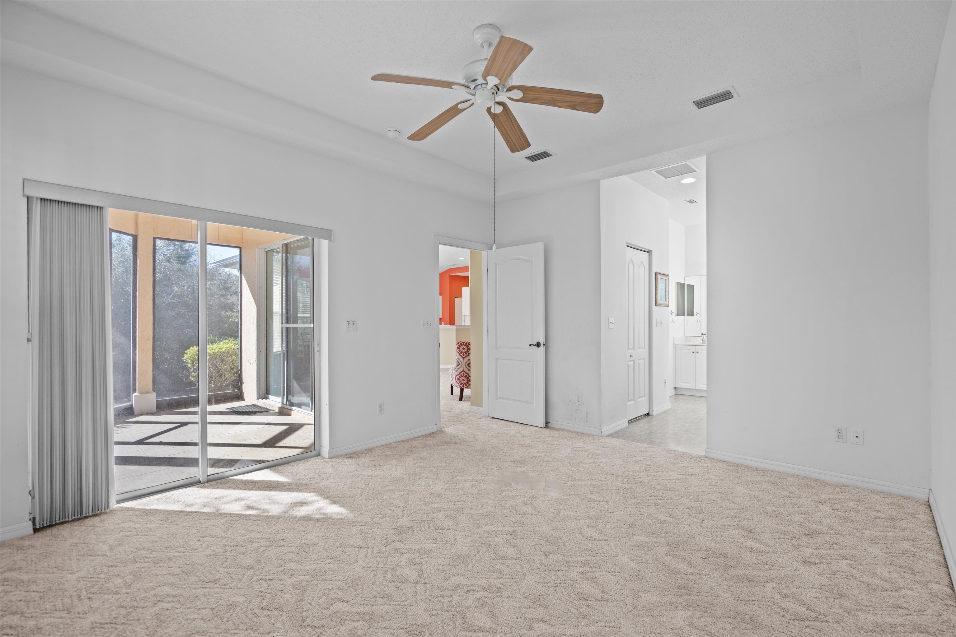 660 Casa Fuerta Lane St. Augustine, FL 32080 - Photo 52 of 52 a view of empty room with wooden floor and fan