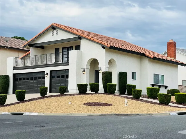 a front view of a house with a garage